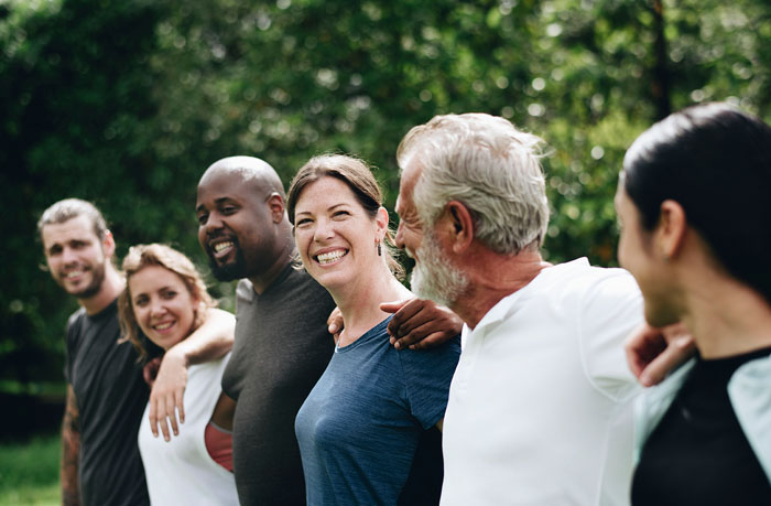 happy group embracing